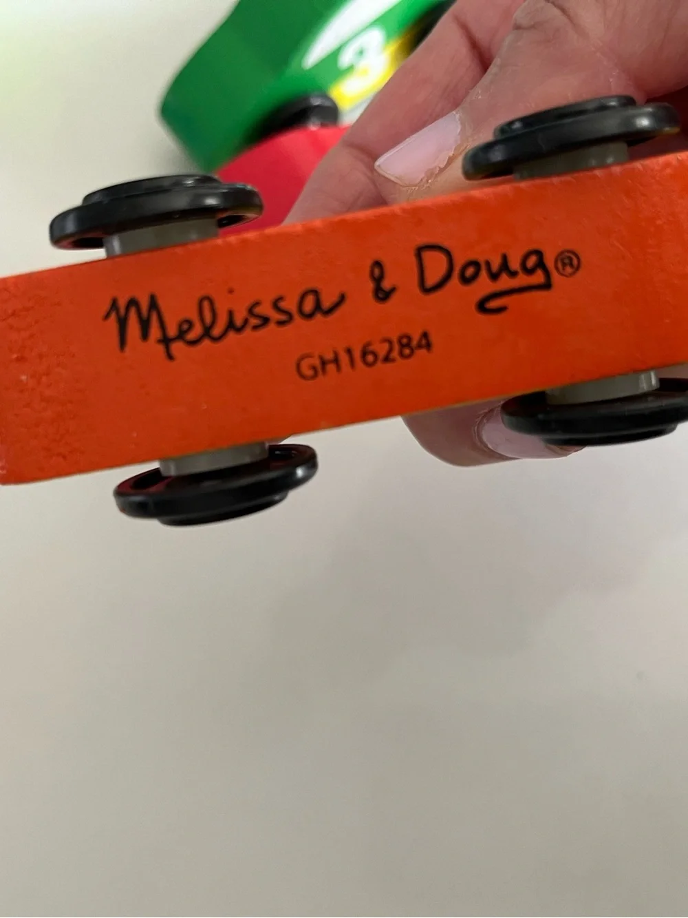 8 wooden racing cars.   Cars Number 1-4 are Melissa & Doug.